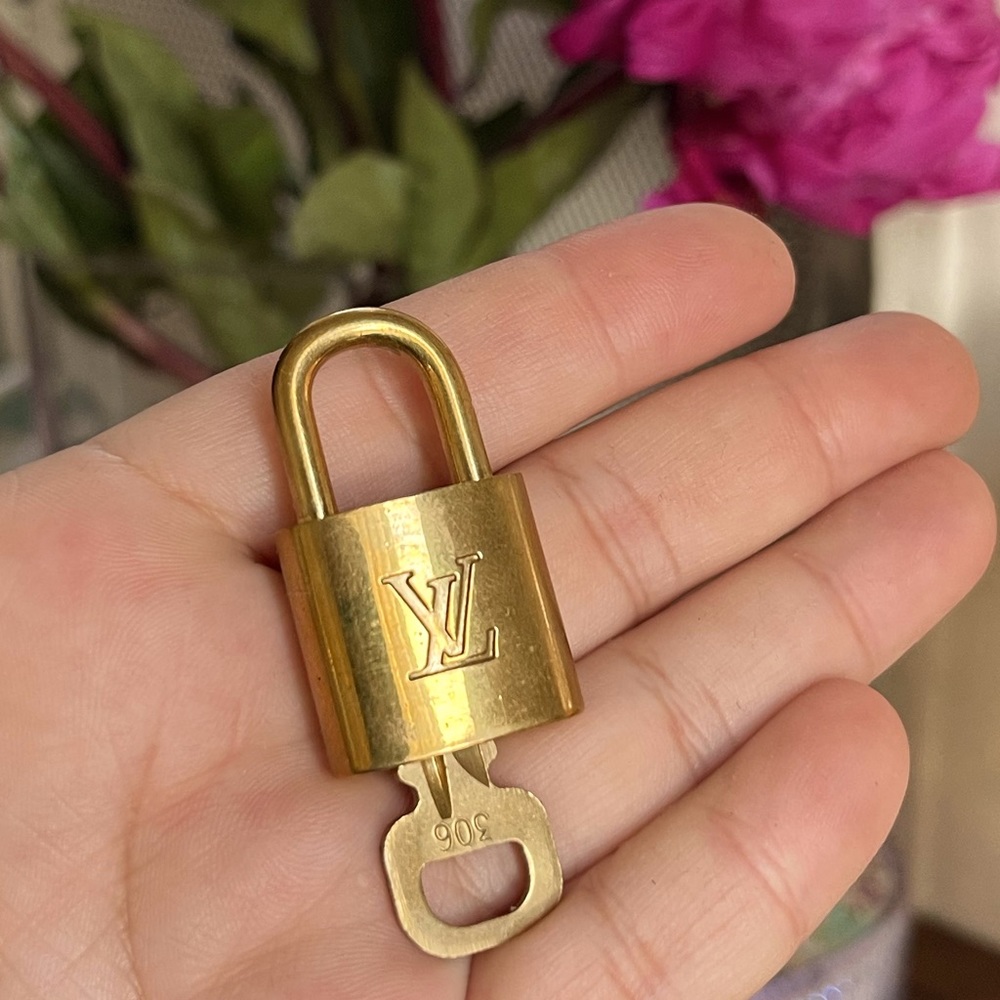 $300 Louis Vuitton Lock and Key